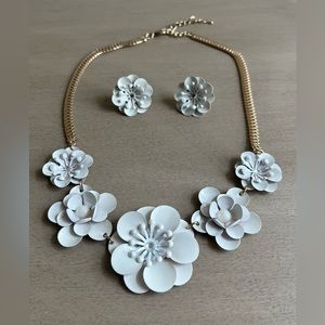 Womens White flowers with a gold chain necklace. White flower earrings.